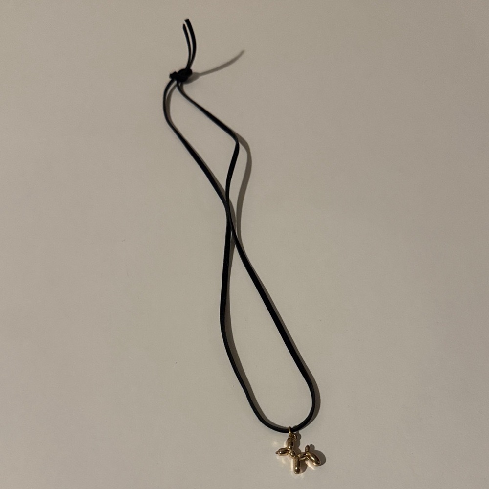 Gold Balloon animal Pendant on Black Cord Necklace